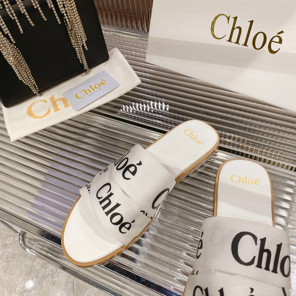 WOODY SLIPPER IN WHITE MIX BLACK CANVAS