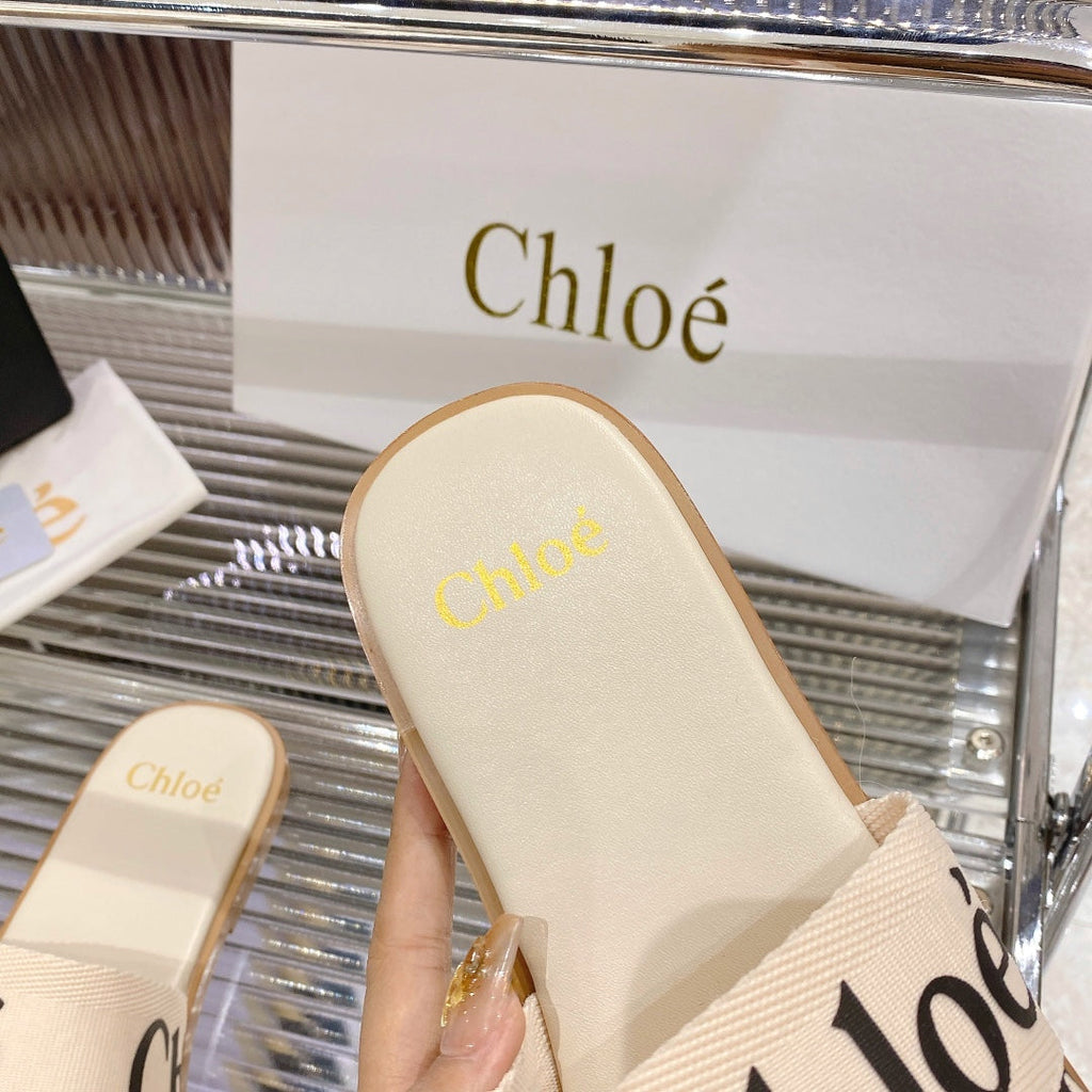 WOODY SLIPPER IN BEIGE MIX BLACK CANVAS