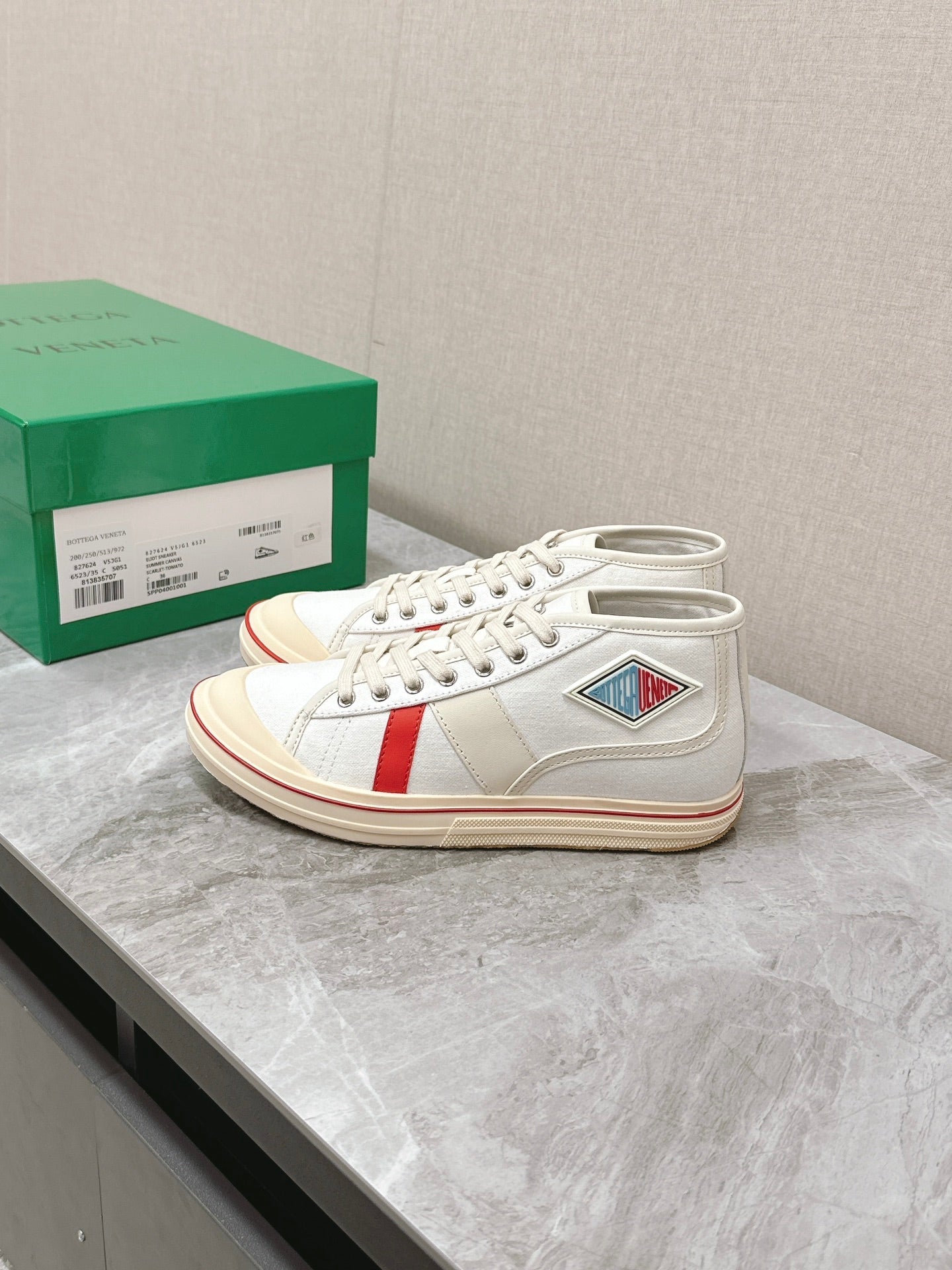 BOTTEGA VENETA ELIOT SNEAKER IN WHITE MIX CHERRY RED CANVAS AND CALFSKIN