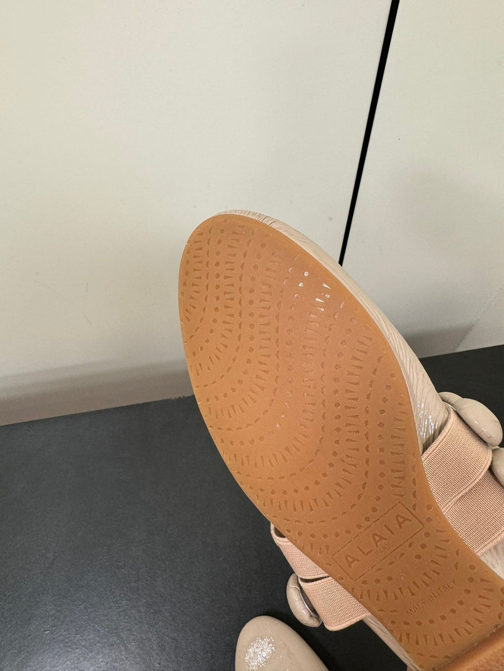 ALAIA SPHERE BALLET FLATS IN ALMOND BEIGE LAMBSKIN