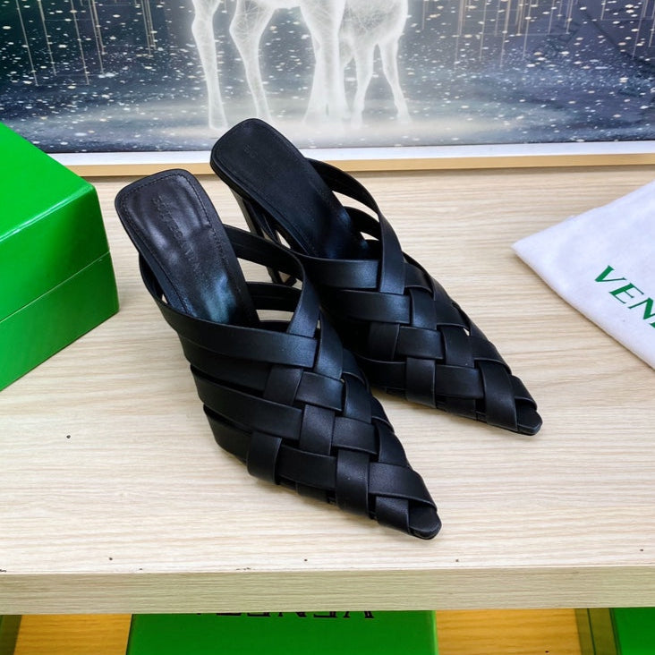 BOTTEGA VENETA ALFIE LEATHER HIGH MULES IN BLACK CALFSKIN WITH WOVEN DESIGN