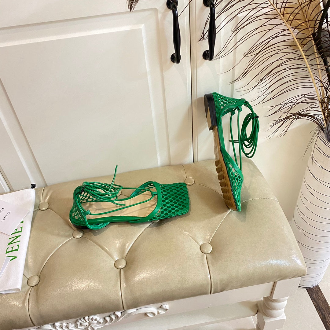BOTTEGA VENETA STRETCH LACE-UP FLAT SANDAL IN COOL GREEN METALLIZED MESH AND LEATHER
