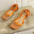 BOTTEGA VENETA LACE-UP FLAT SANDAL IN VIVID ORANGE METALLIZED MESH AND LEATHER WITH RHINSTONES