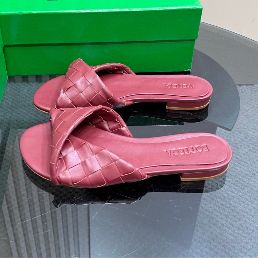 BOTTEGA VENETA BLINK FLAT MULE IN BERRY RED INTRECCIATO LEATHER