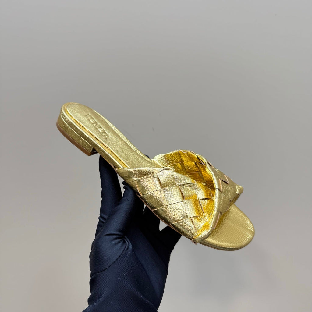 BOTTEGA VENETA BLINK FLAT MULE IN GOLD INTRECCIATO LEATHER